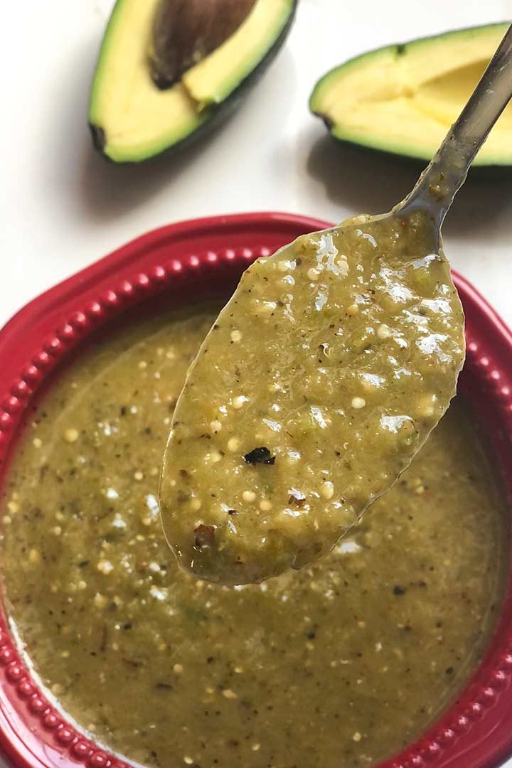 spooned closeup of homemade Salsa Verde.
